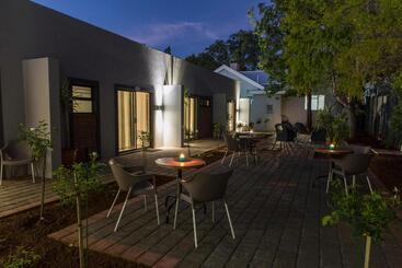 پانسیون Touching Senses Garden Cottages