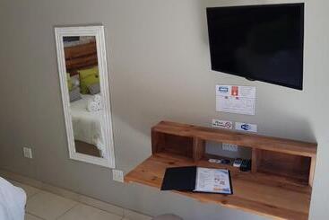 Пансион Touching Senses Garden Cottages