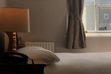 هتل Harveys Guest House