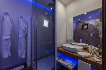 تختخواب و صبحانه Kete Deluxe Rooms