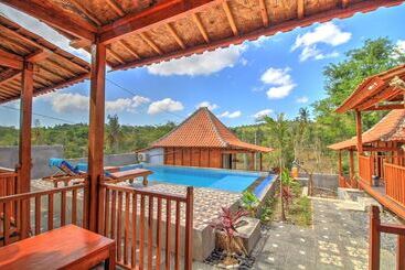 تختخواب و صبحانه Raja Bungalow By Wizzela
