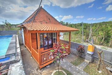 تختخواب و صبحانه Raja Bungalow By Wizzela