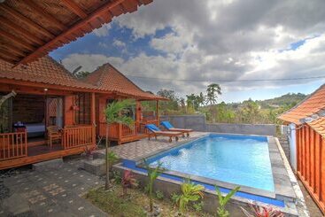 تختخواب و صبحانه Raja Bungalow By Wizzela