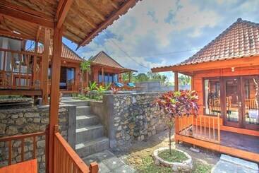 تختخواب و صبحانه Raja Bungalow By Wizzela