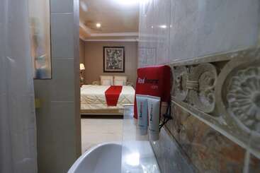 Отель Urbanview De Dharmawangsa Suite