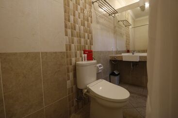Отель Urbanview De Dharmawangsa Suite