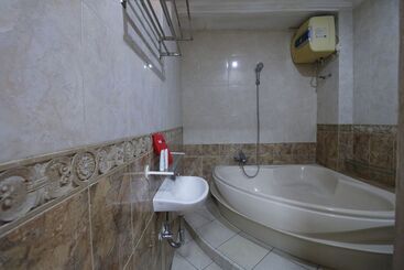 Отель Urbanview De Dharmawangsa Suite