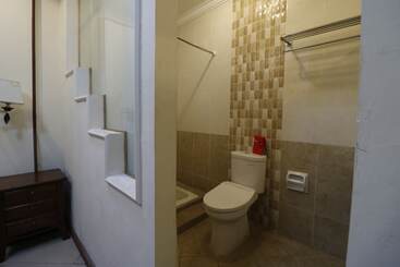 Отель Urbanview De Dharmawangsa Suite