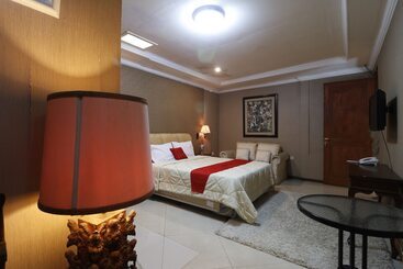 Отель Urbanview De Dharmawangsa Suite