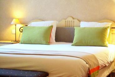 酒店 Logis Hostellerie Des Clos Et Restaurant Bistrot Des Grands Crus
