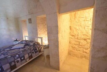تختخواب و صبحانه Trulli Petra Chiara