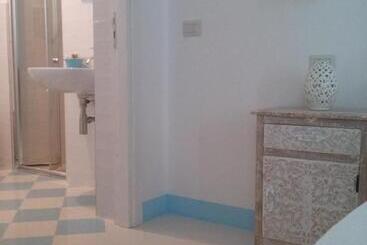 تختخواب و صبحانه Trullitria Rooms