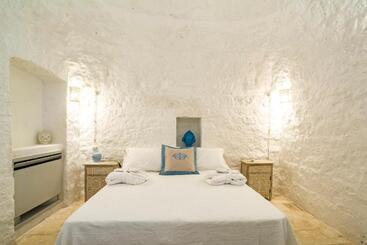 تختخواب و صبحانه Trullitria Rooms