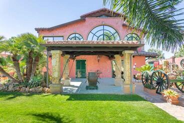 تختخواب و صبحانه Villa Flumini