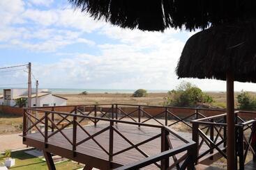پانسیون Villa Namú Beach House Suites