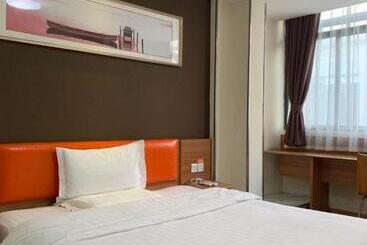 هتل 7days Inn Yingshang Lan Star Building Materials Market