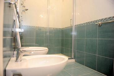 تختخواب و صبحانه L Isola Del Postino Rooms