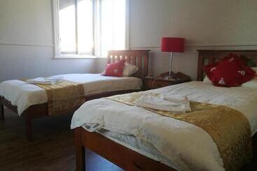 پانسیون Pure Land Guest House