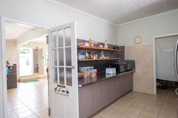 پانسیون Pure Land Guest House