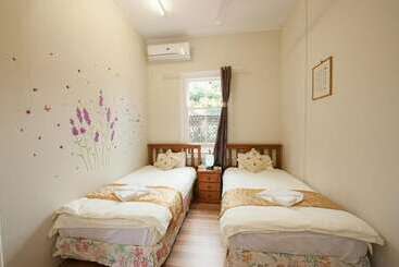 پانسیون Pure Land Guest House