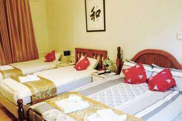 پانسیون Pure Land Guest House