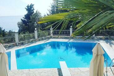 تختخواب و صبحانه Perivolos Apartments