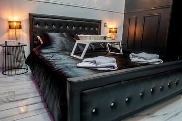 Appart Hotel Glam88 Suites Avec Spa Et Sauna Privatif