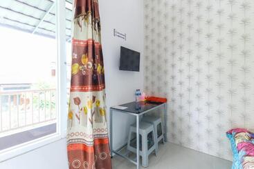 پانسیون Griya Mulya Near Alun Alun Batu Mitra Reddoorz