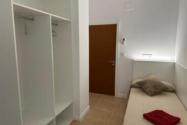 Albergue O Pedrón Hostel & Rooms
