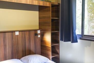 בית מלון כפרי Huttopia Landes Sud