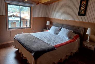 پانسیون Hostal Y Cabañas Ventisquero