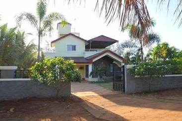 هتل Megh Malhar Agro Tourism