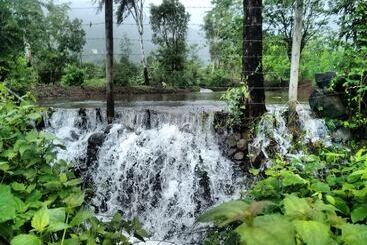 هتل Megh Malhar Agro Tourism