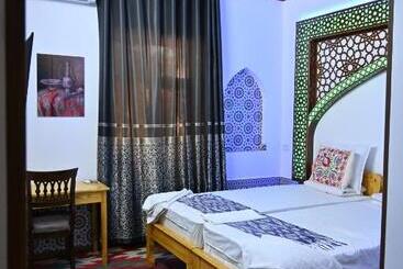 پانسیون Khiva Tosh Darvoza & Trip Service