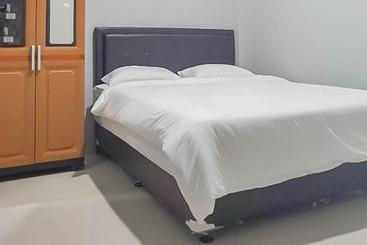 هتل Mahkota Residence Mitra Reddoorz