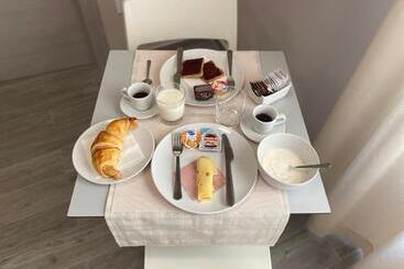 تختخواب و صبحانه Le Origini Rooms&suite