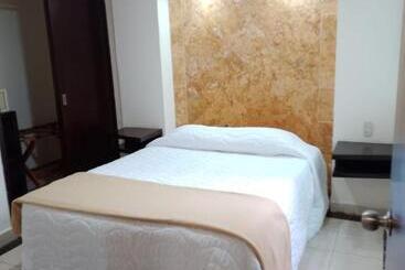 Angeles Suites & Hotel
