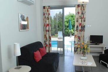 Natura Beach Hotel And Villas
