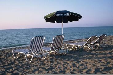 Natura Beach Hotel And Villas