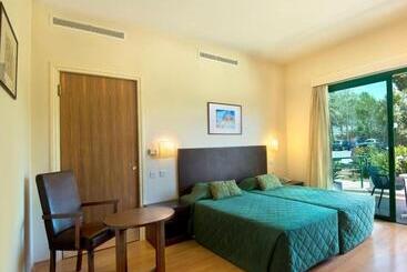 Natura Beach Hotel And Villas