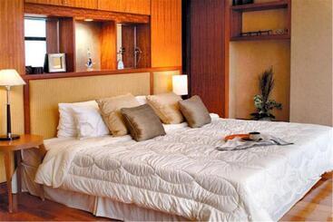 هتل Dalian Asia Pacific Service Apartment
