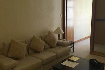 هتل Dalian Asia Pacific Service Apartment