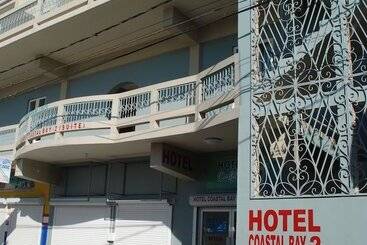 هتل Coastalbay 2 & Golf Cart Rental