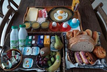 تختخواب و صبحانه De Linderd
