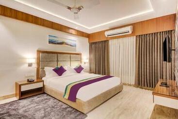 Отель Treebo Premium Tahoora International