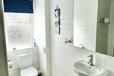 هتل Devon House Guest House
