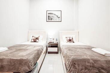 هتل Krisan Guest House Syariah Banjarbaru Mitra Reddoorz