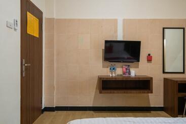 هتل Reddoorz Plus Near Ramayana Pematangsiantar