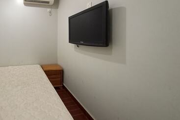 בית מלון כפרי Oyo 90248 Kapitan Inn
