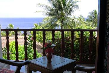 هتل Puri Bunga Beach Cottages